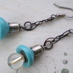 工業系ランプの様なピアス　水色